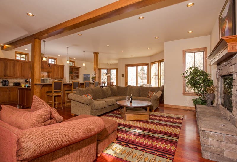 Open-concept living room with kitchen.