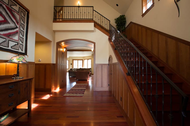 Wooden staircase and hallway interior.