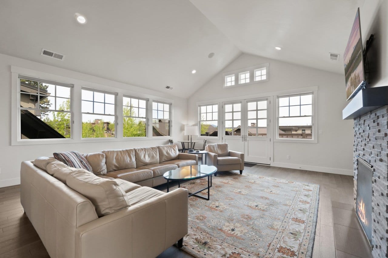 Bright living room with sectional sofa.