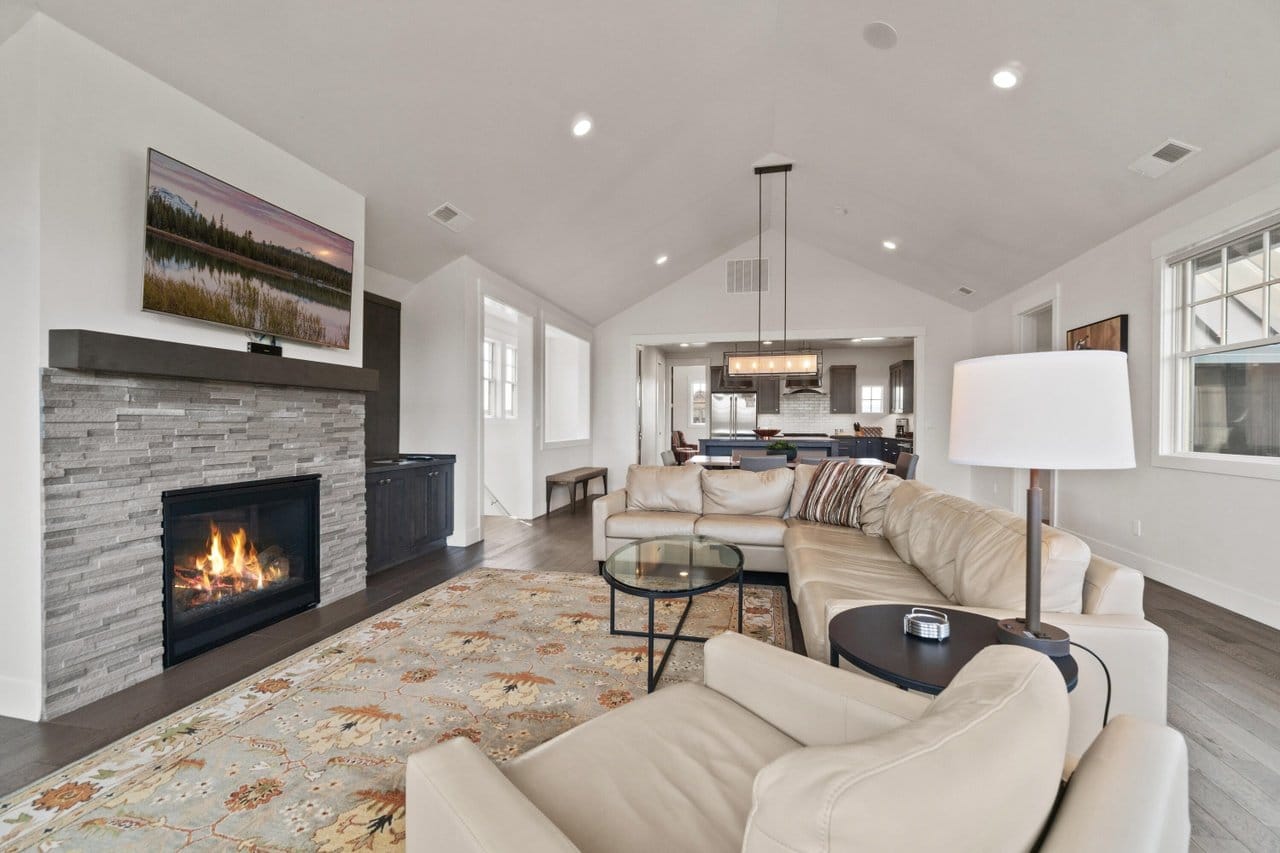 Living room with fireplace and couch.