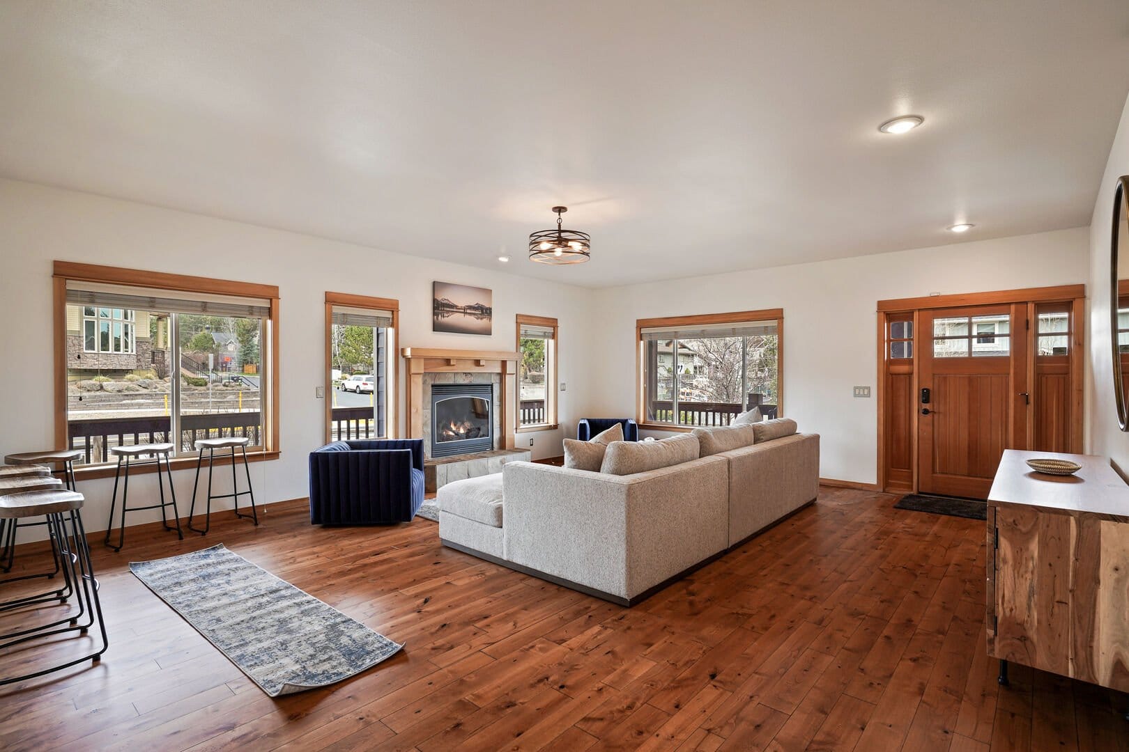 Spacious living room with fireplace.