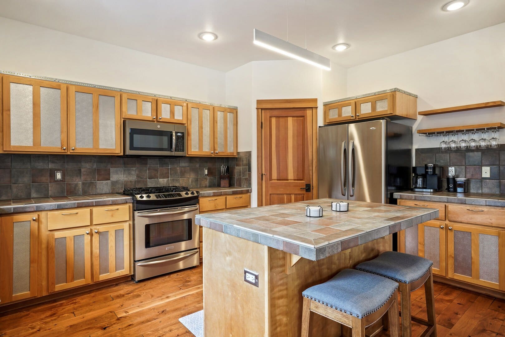 Modern kitchen with wooden cabinets.