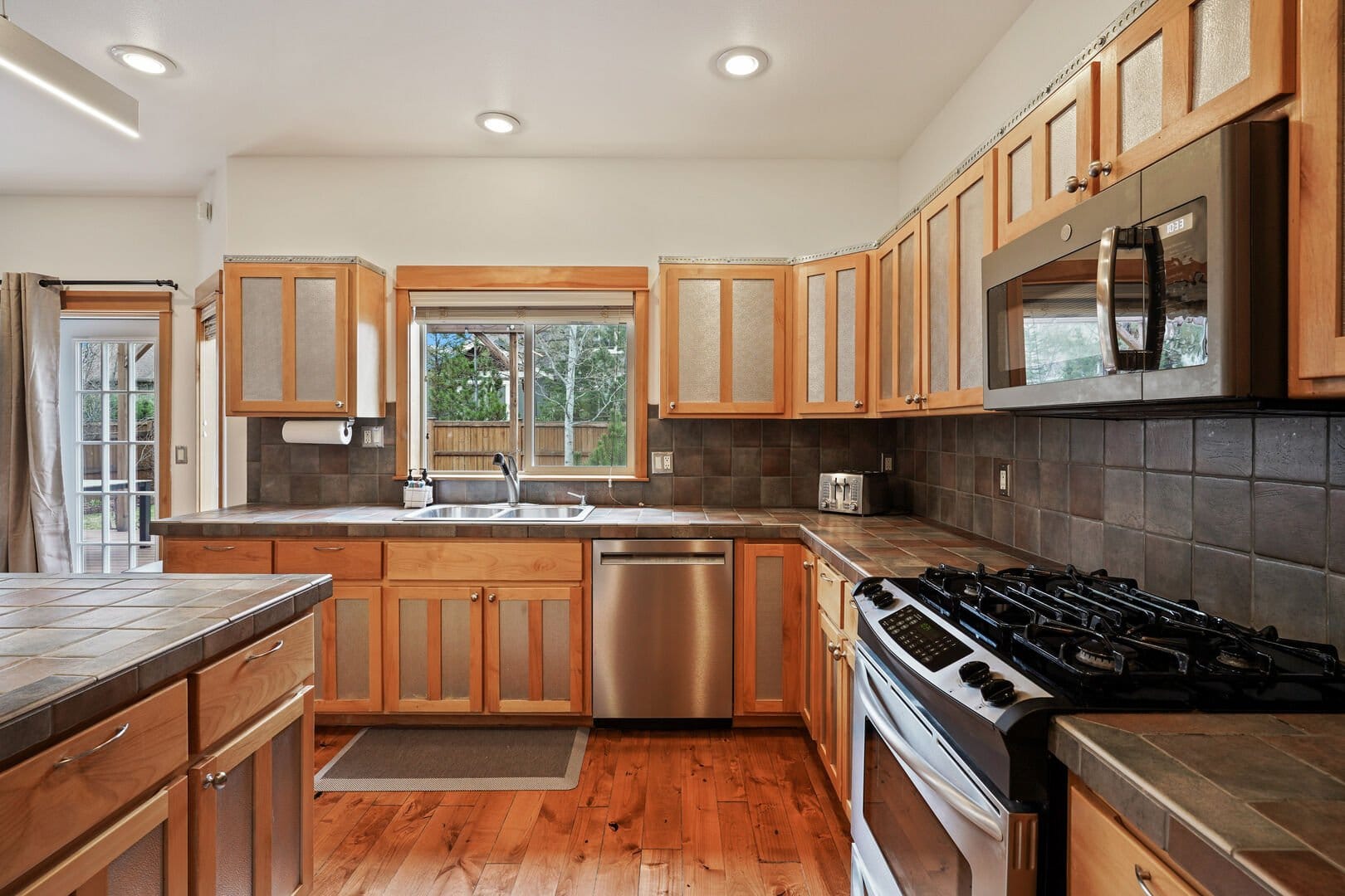 Modern kitchen with wooden cabinets.