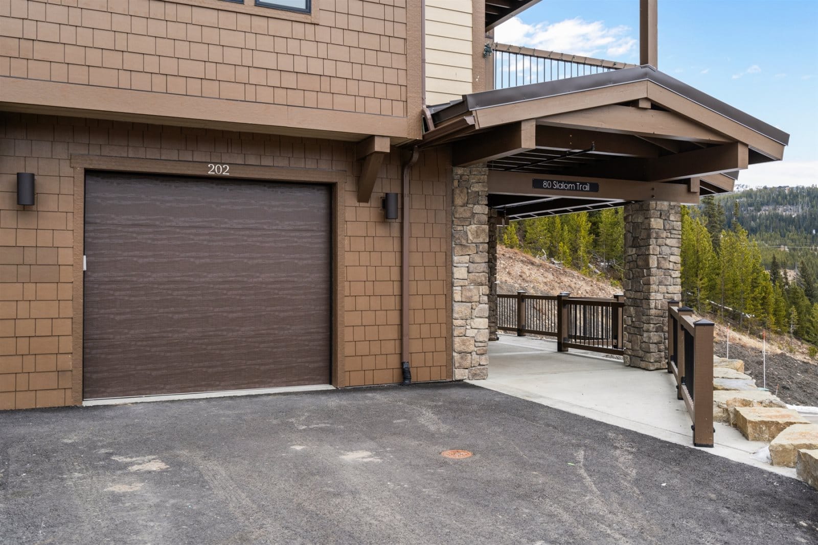 Brown garage door and entrance.