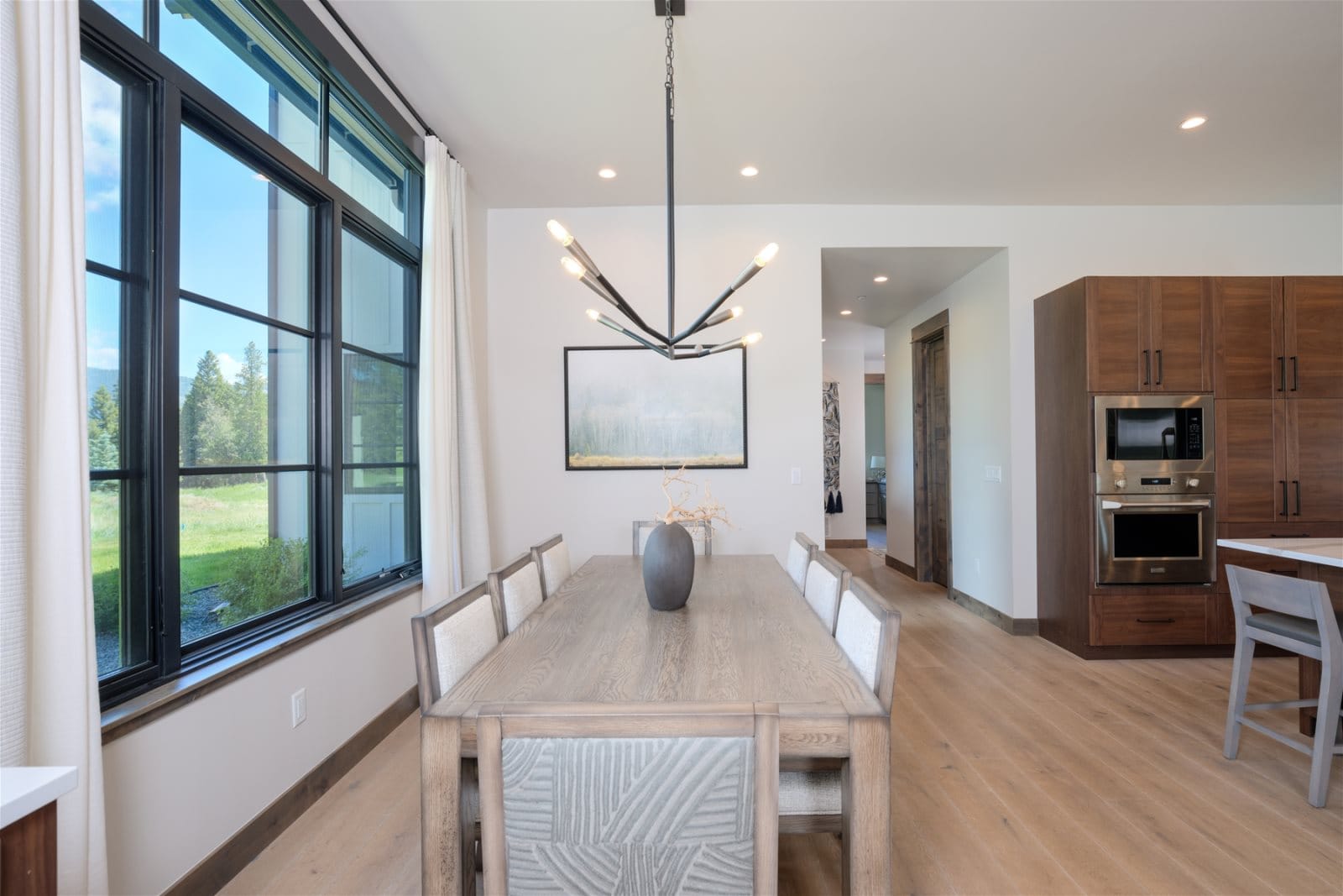 Modern dining room with large windows