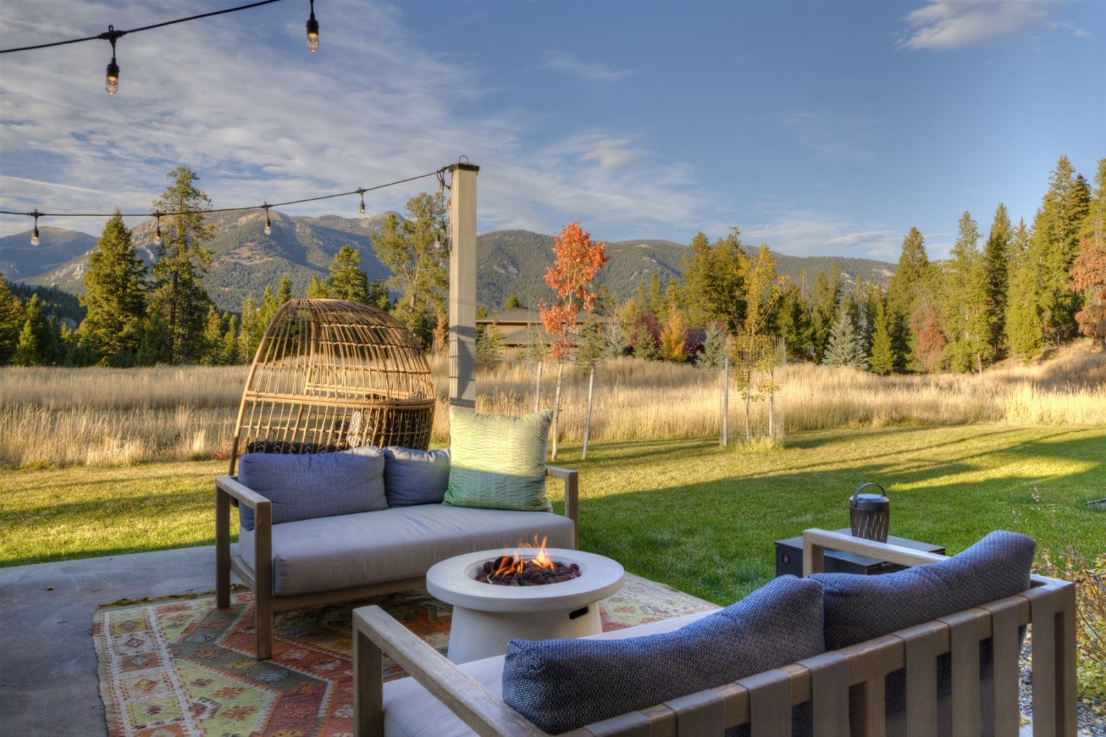 Cozy outdoor seating with firepit.