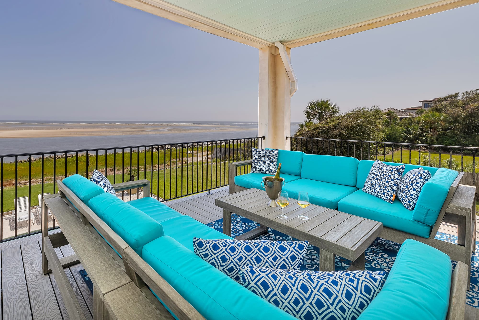 Patio with blue outdoor furniture.