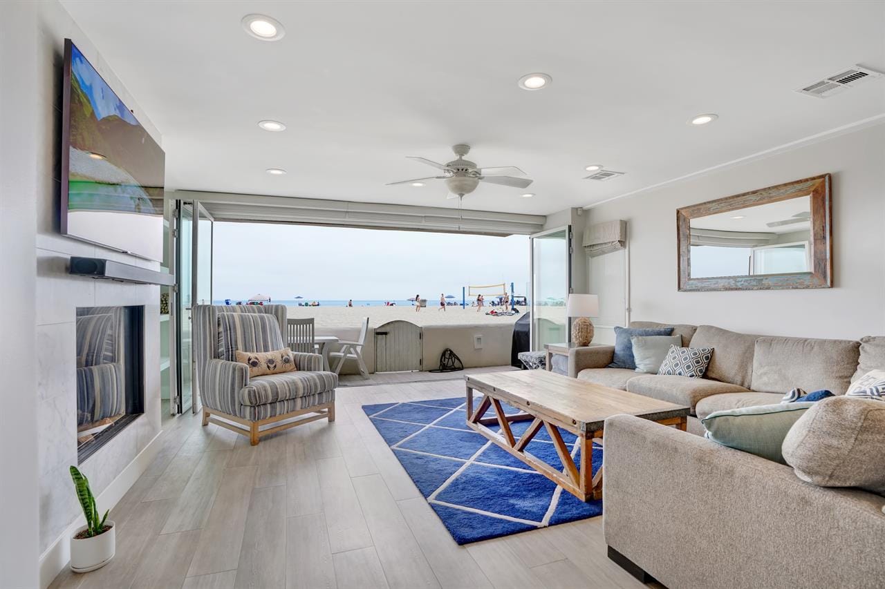 Beachfront living room with ocean view.