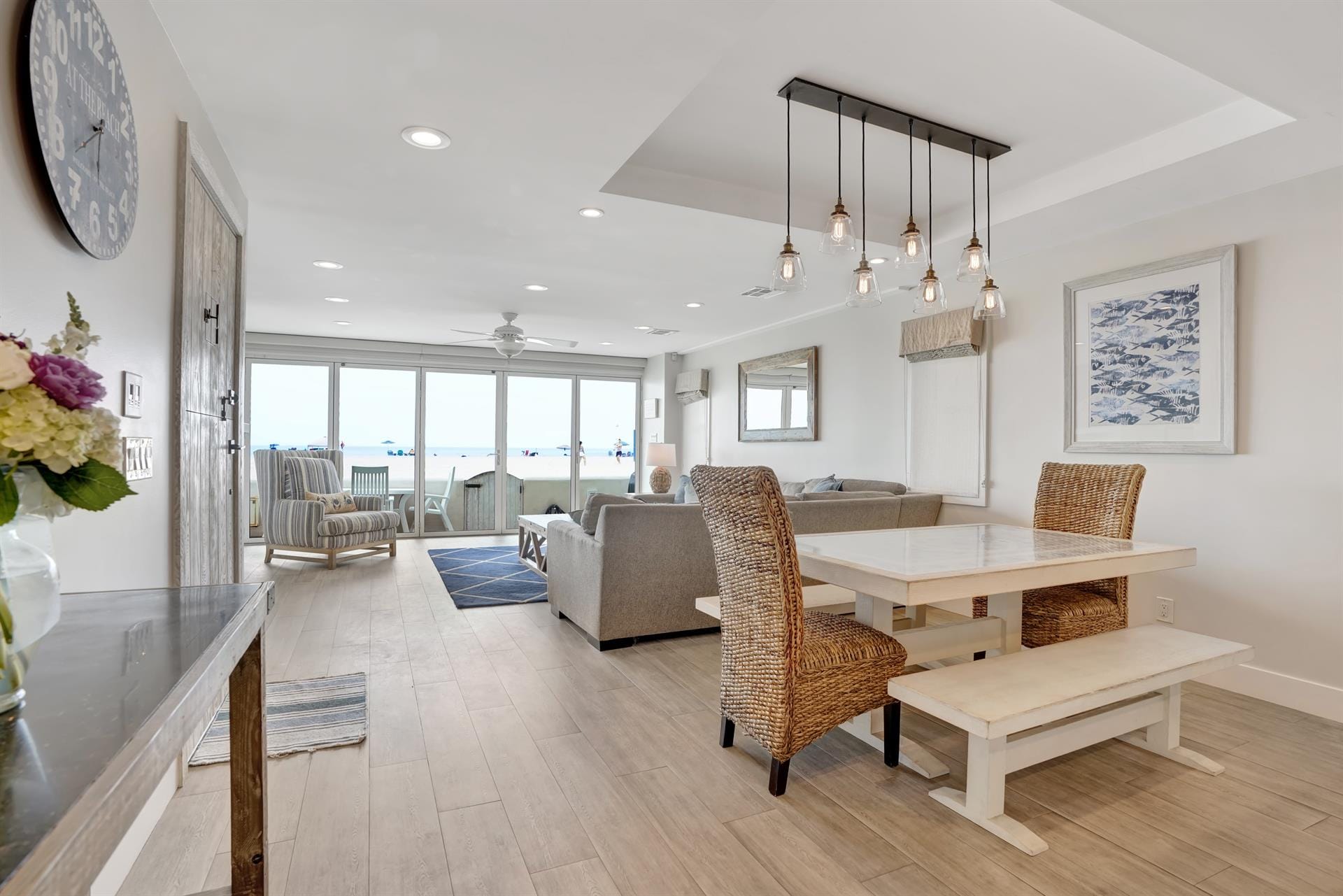 Beachfront living room with dining area.