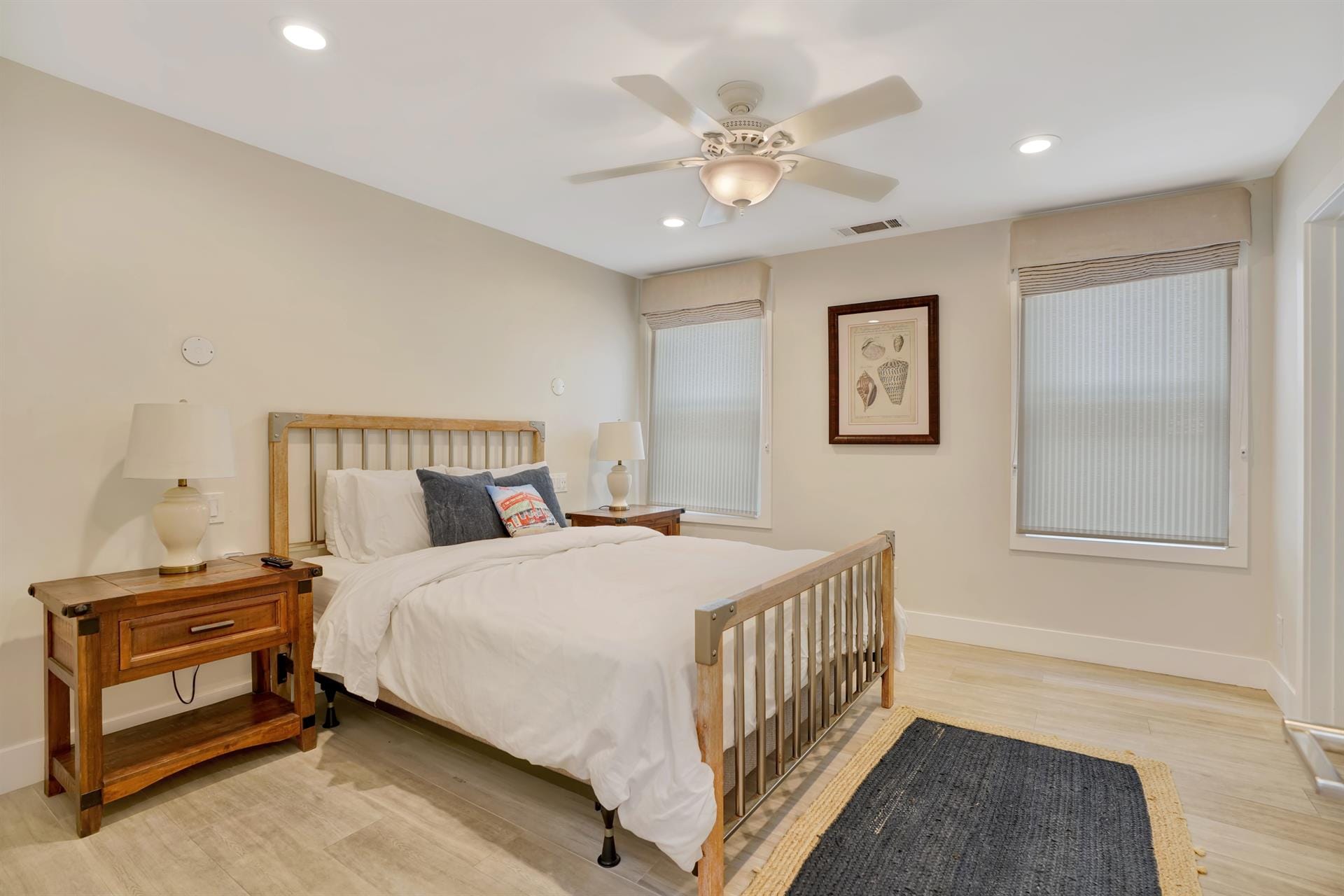 Modern bedroom with wooden furniture.