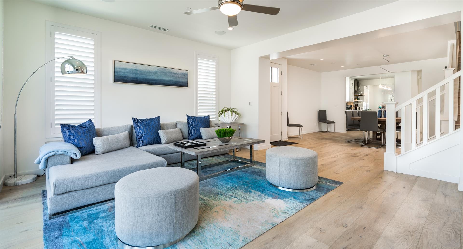 Modern living room and kitchen area.