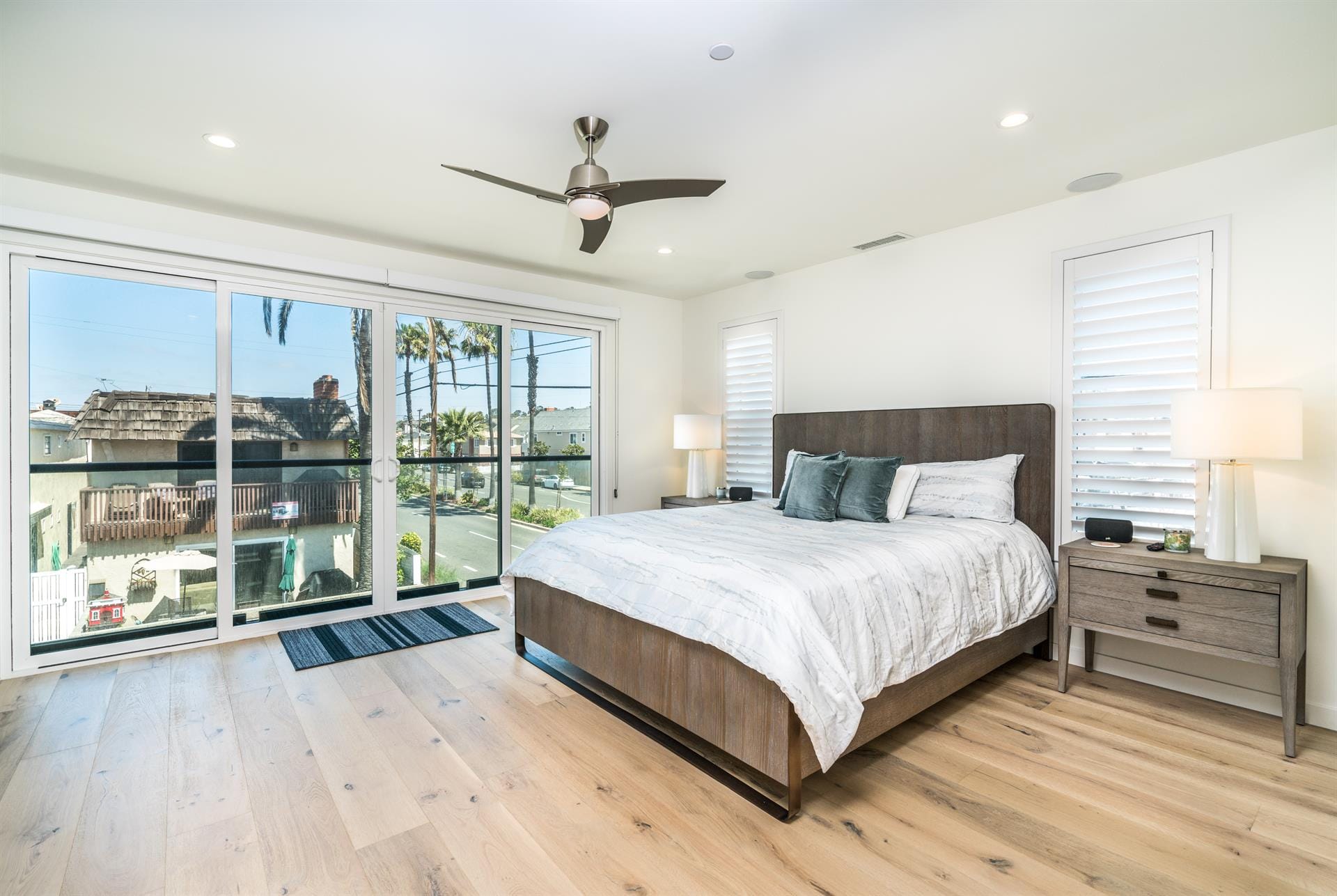 Modern bedroom with large windows