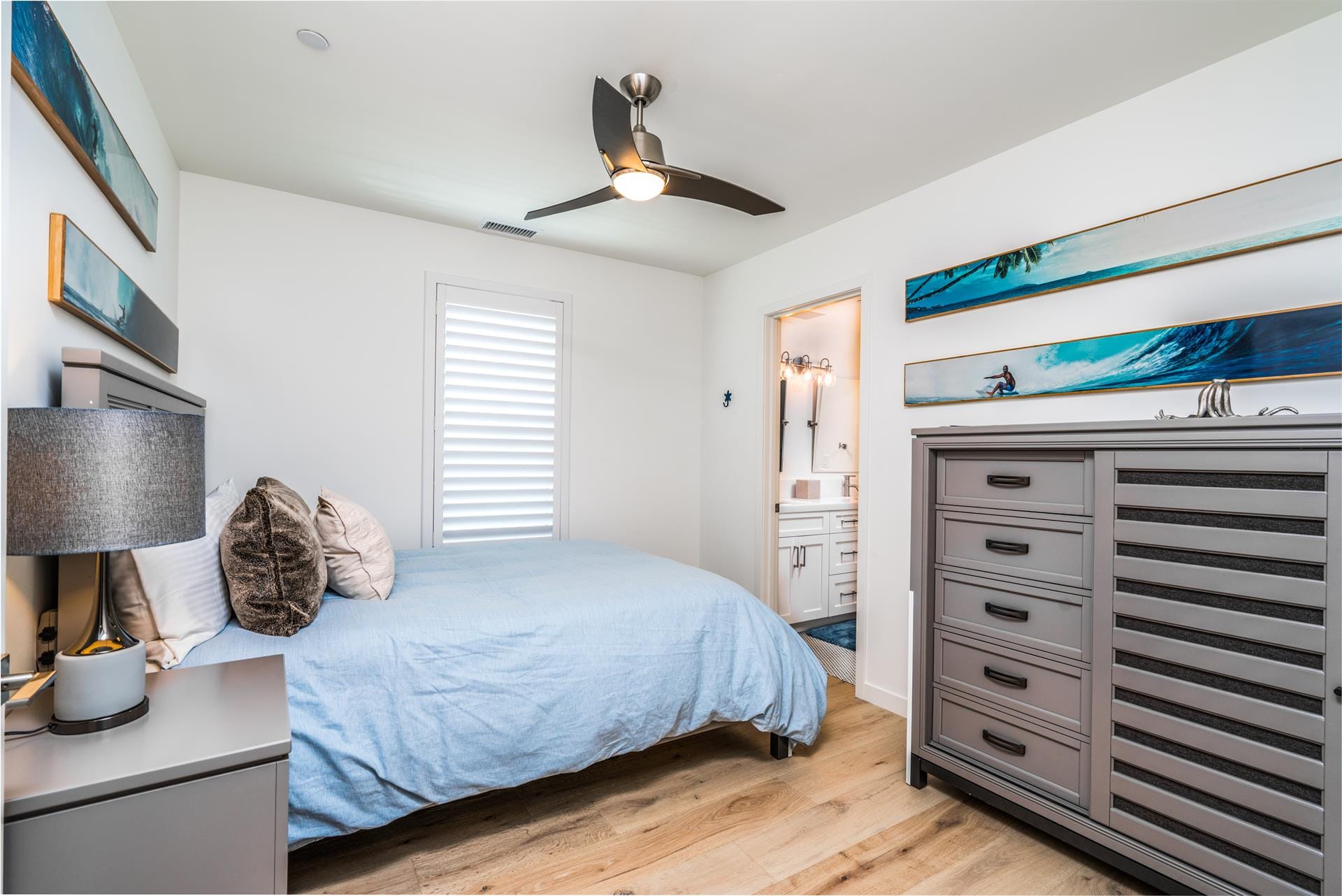 Modern bedroom with ceiling fan.