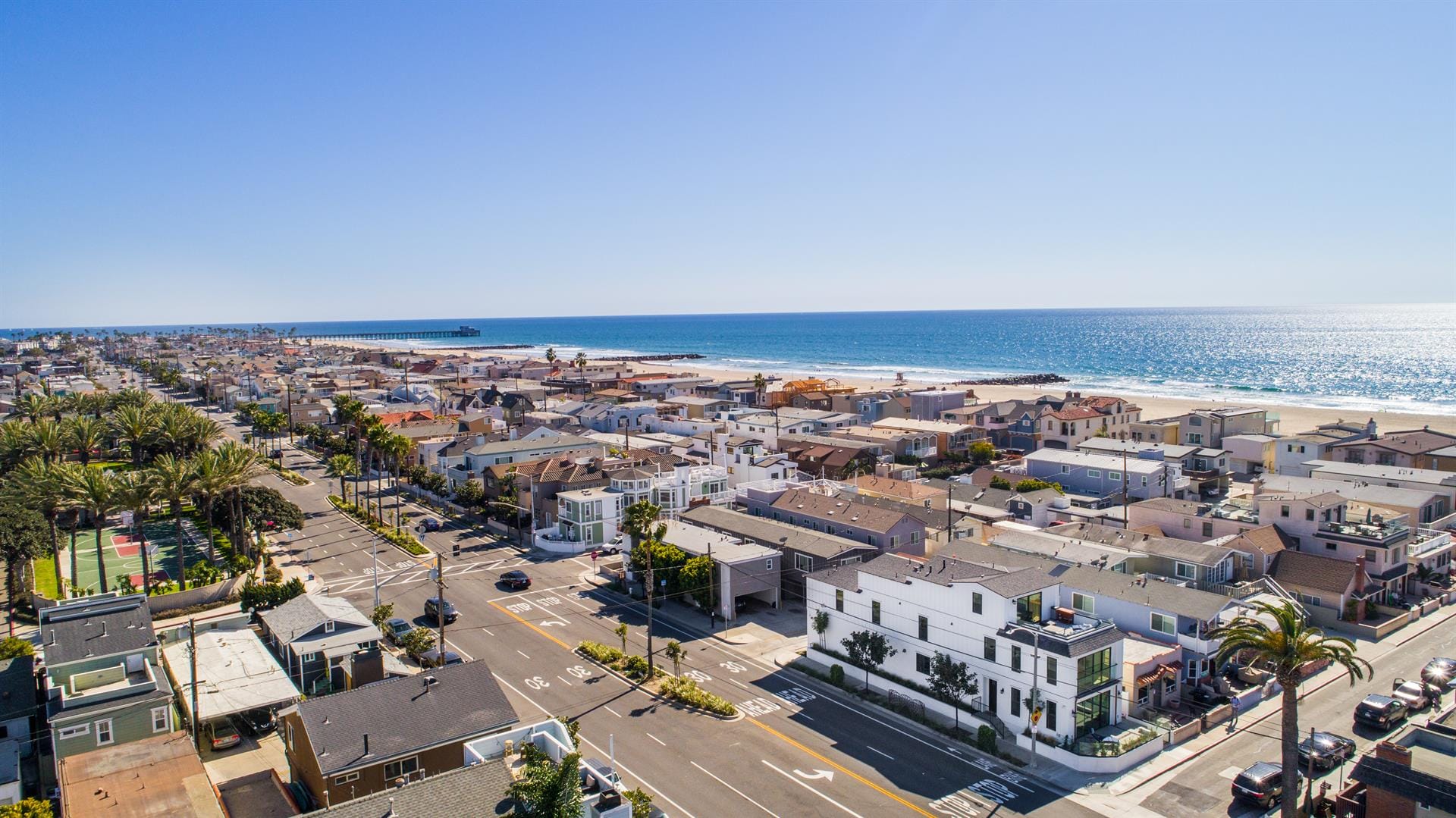 Seaside town with palm trees.