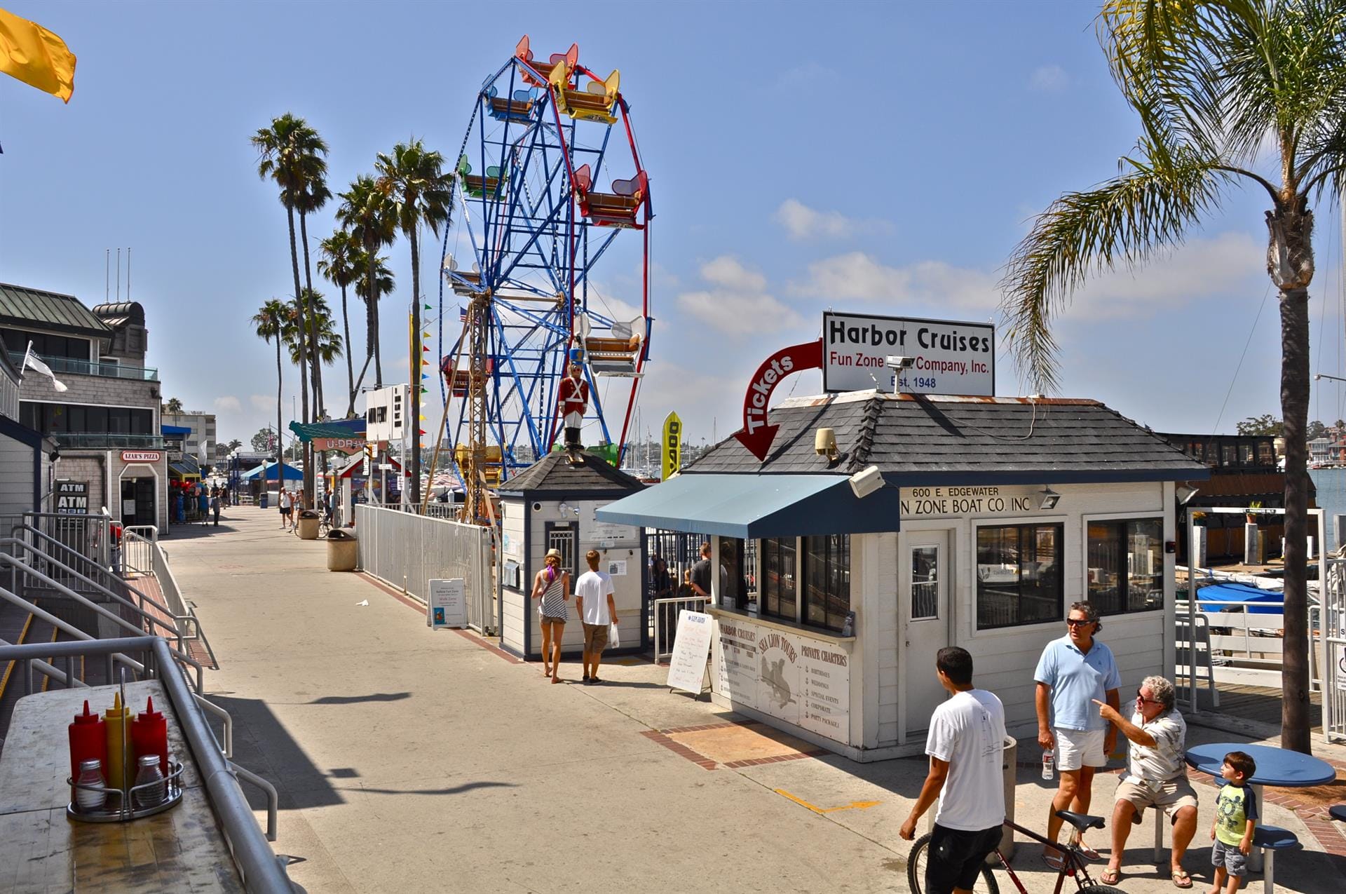 Seaside pier with ferris wheel