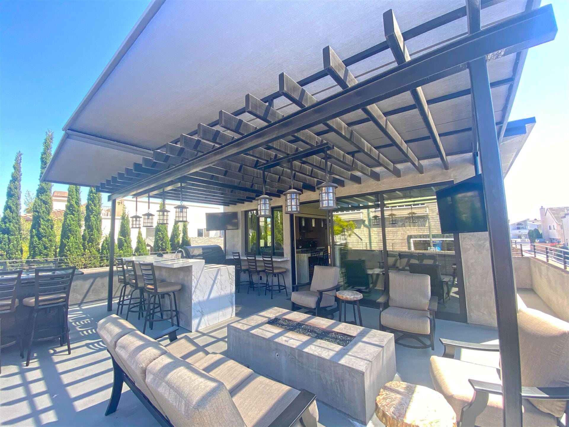 Modern outdoor patio with pergola.