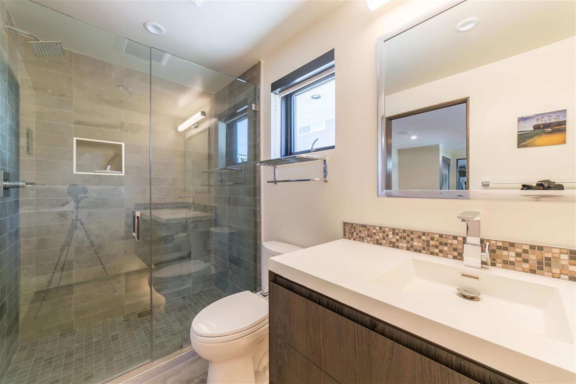 Modern bathroom with glass shower.