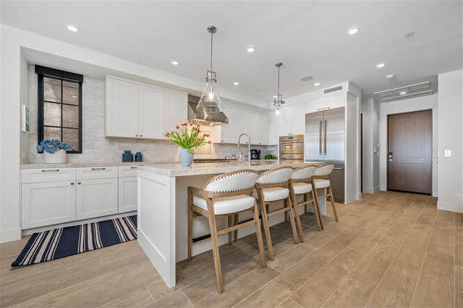 Modern kitchen with island seating.