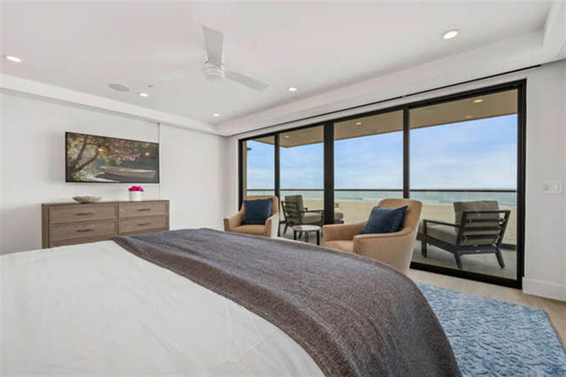 Bedroom with ocean view balcony.