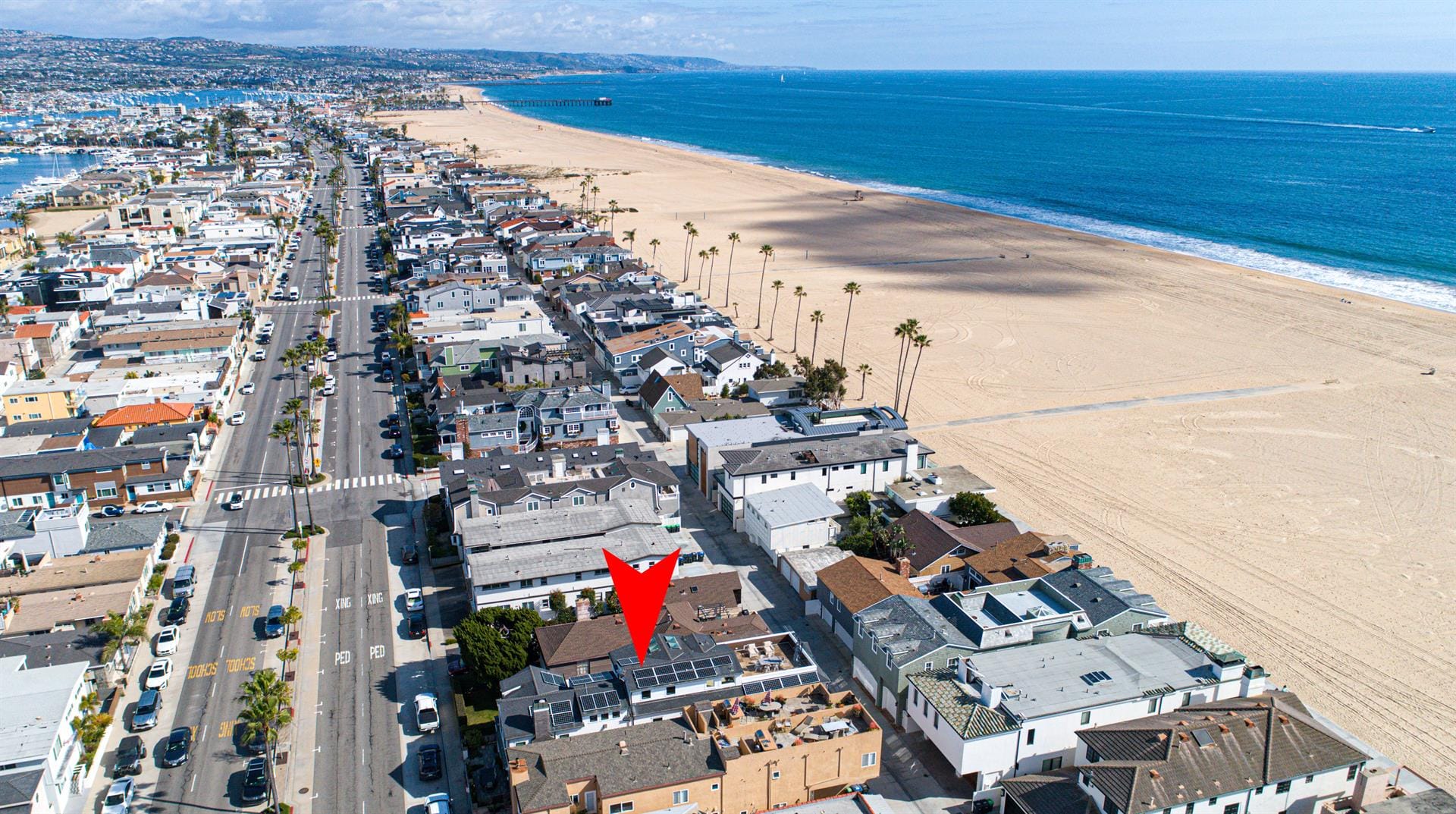 Beachfront neighborhood with a red marker.