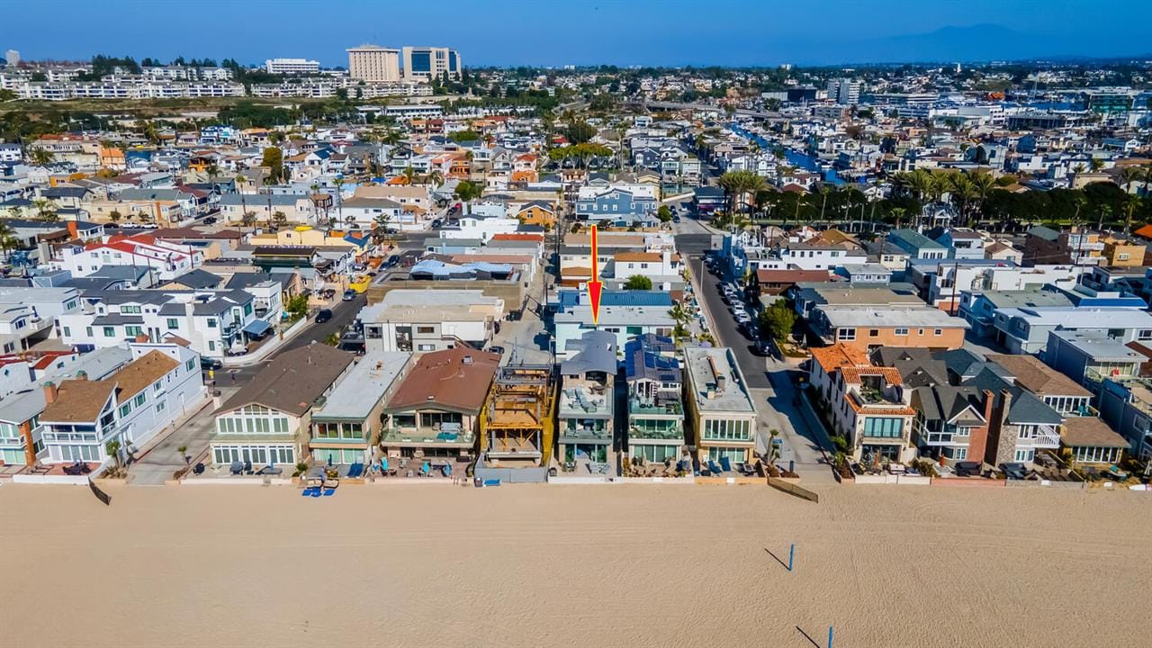 Aerial view of beachside neighborhood.