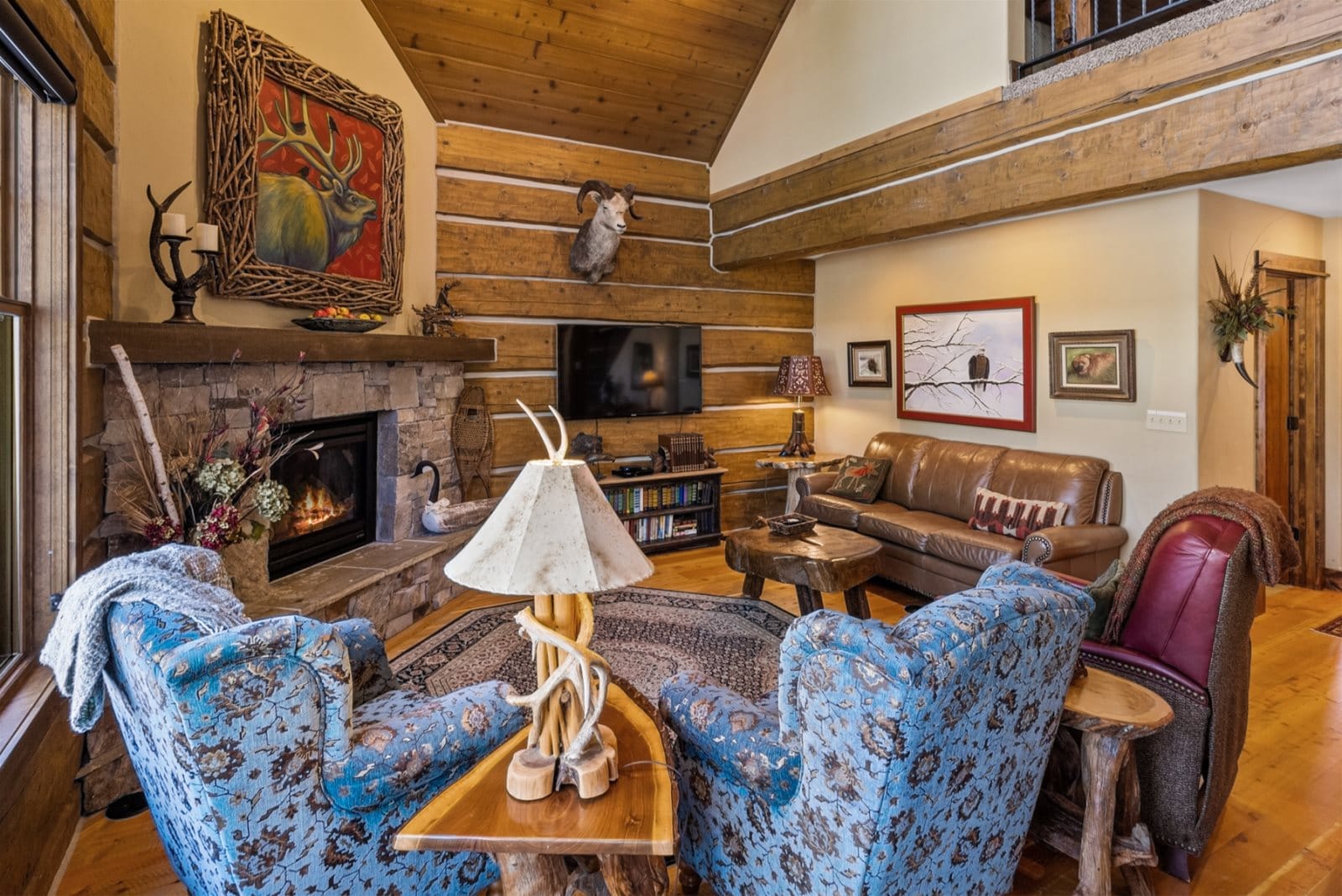 Cozy rustic living room with fireplace.