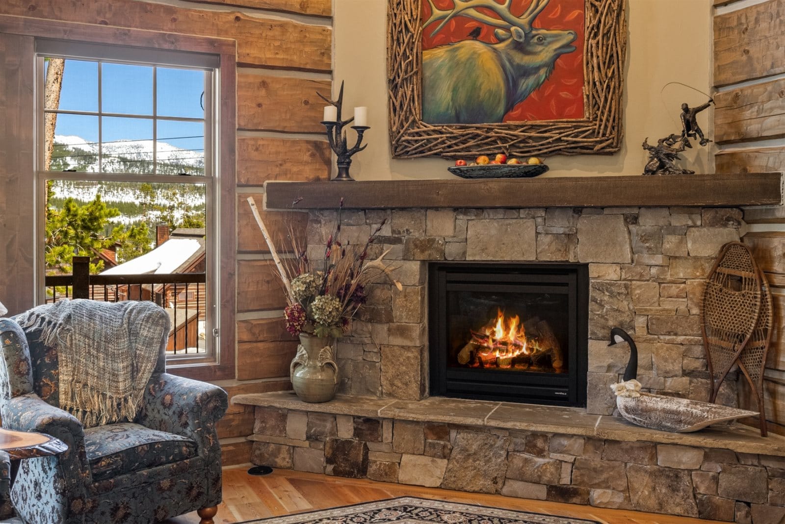 Cozy cabin interior with fireplace.