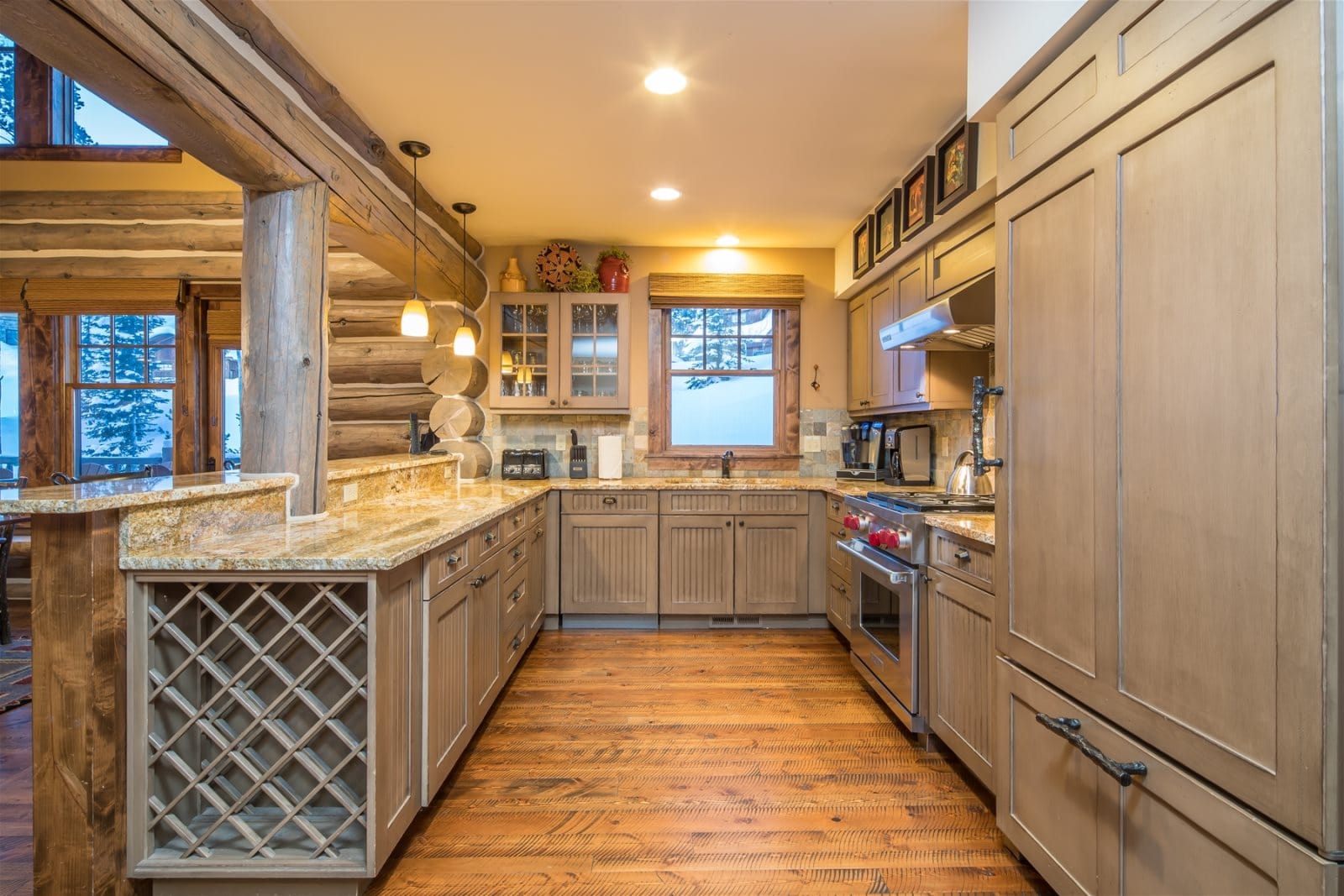 Rustic kitchen with wooden cabinets.