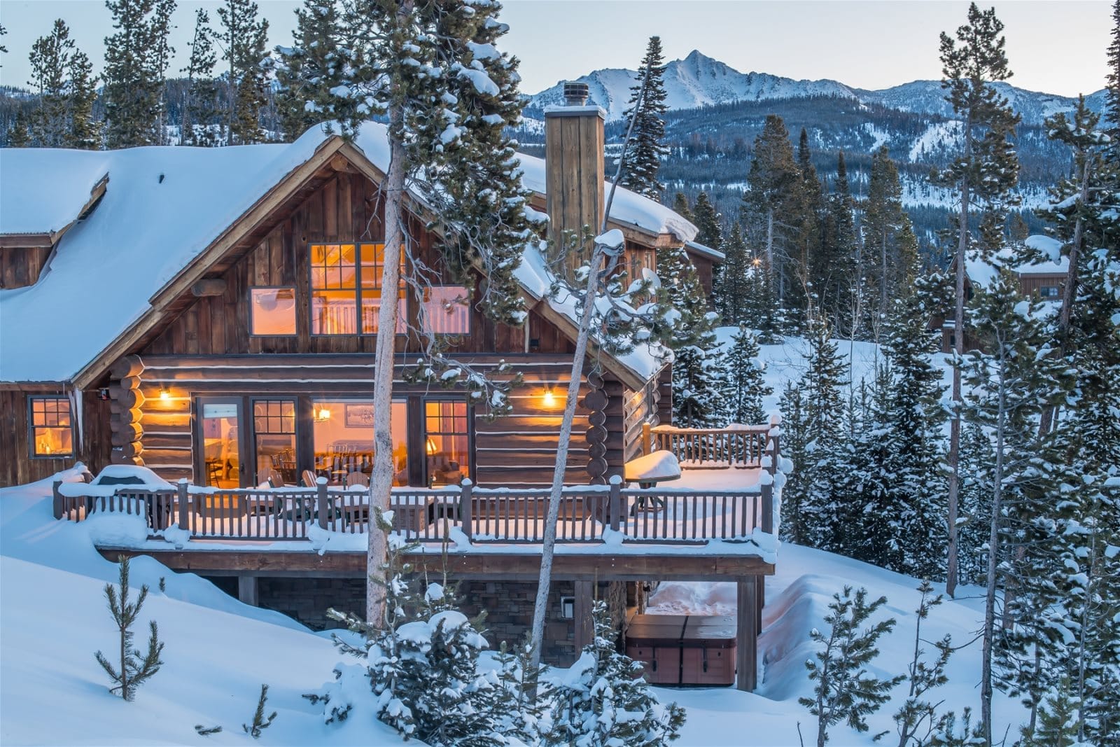 Snowy cabin in the mountains.