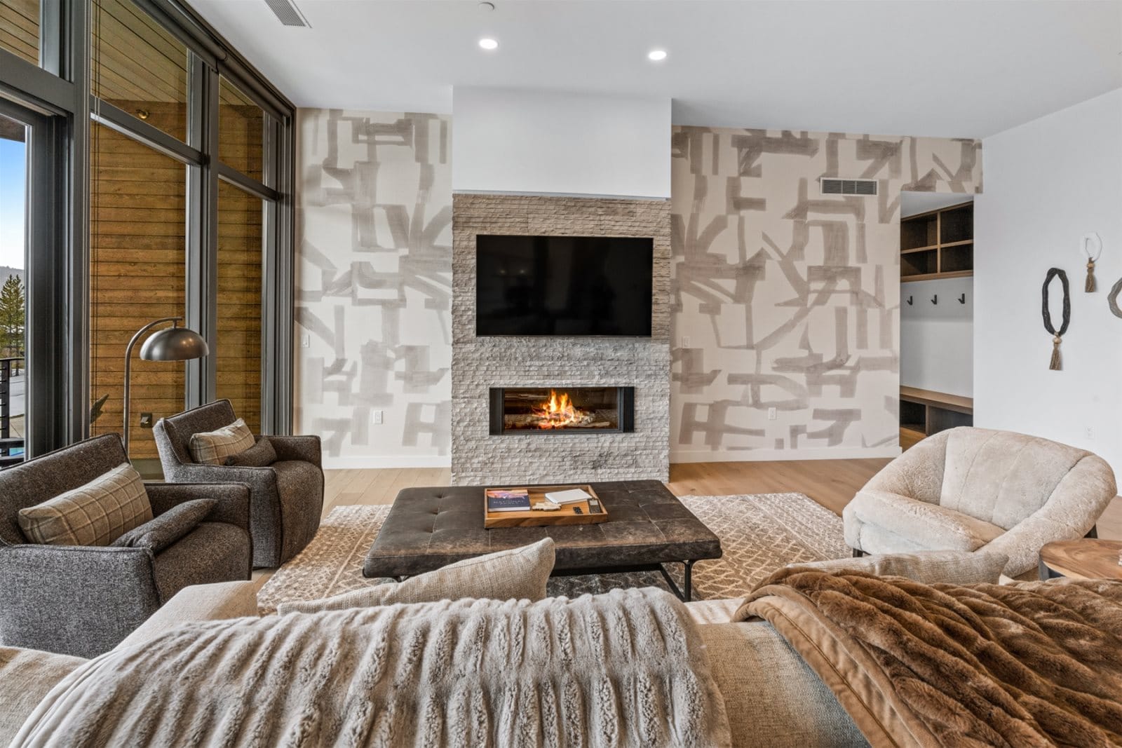 Modern living room with fireplace.