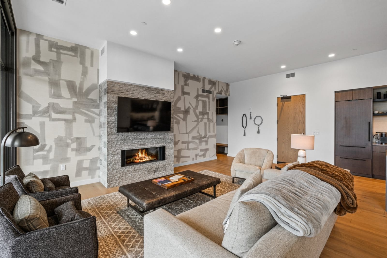 Modern living room with fireplace.