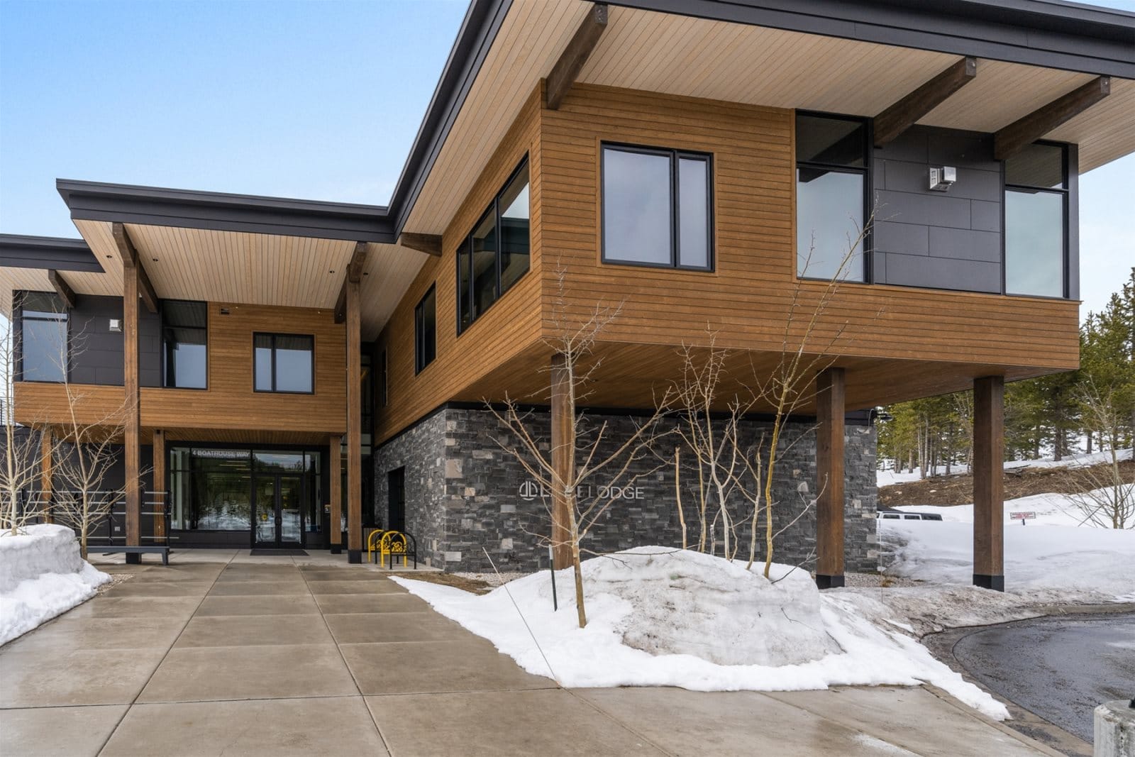 Modern lodge in snowy landscape.