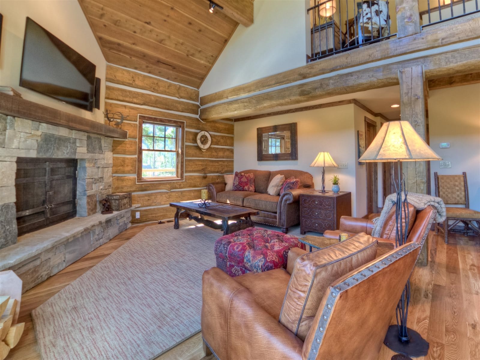 Rustic living room with fireplace.