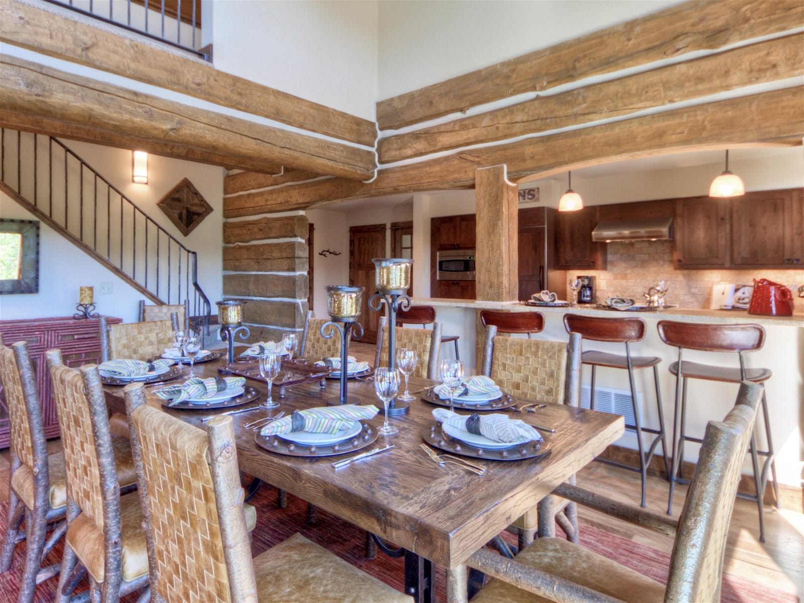 Rustic dining room with kitchen island.