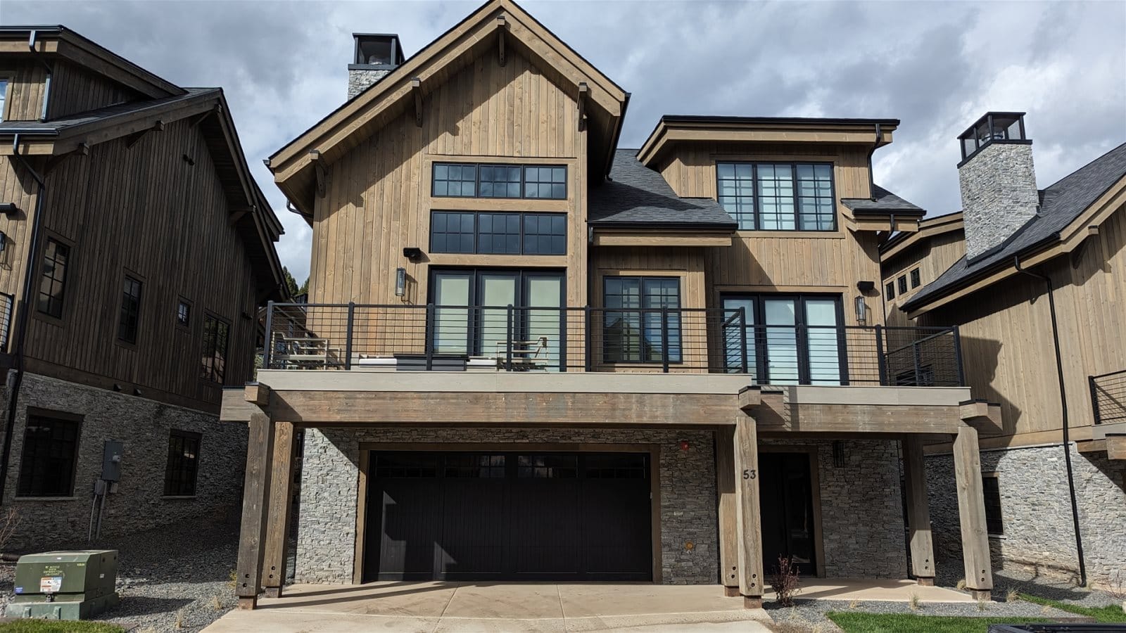 Modern two-story house with garage.