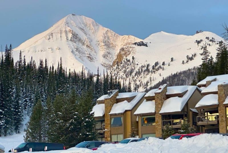 Snowy mountain and cabins in winter.