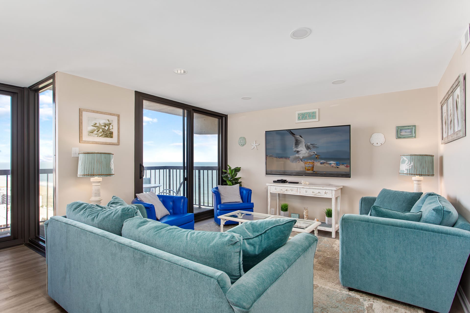 Beachfront living room with ocean view.