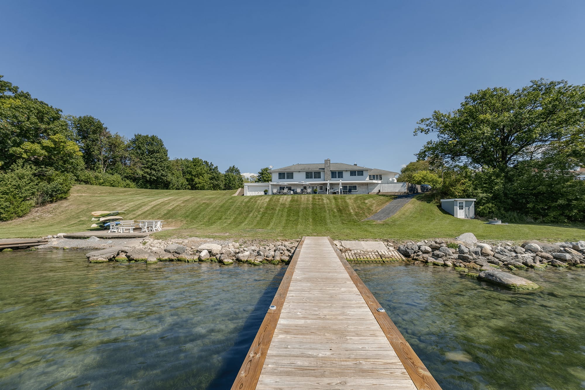 Dock leading to house on hill