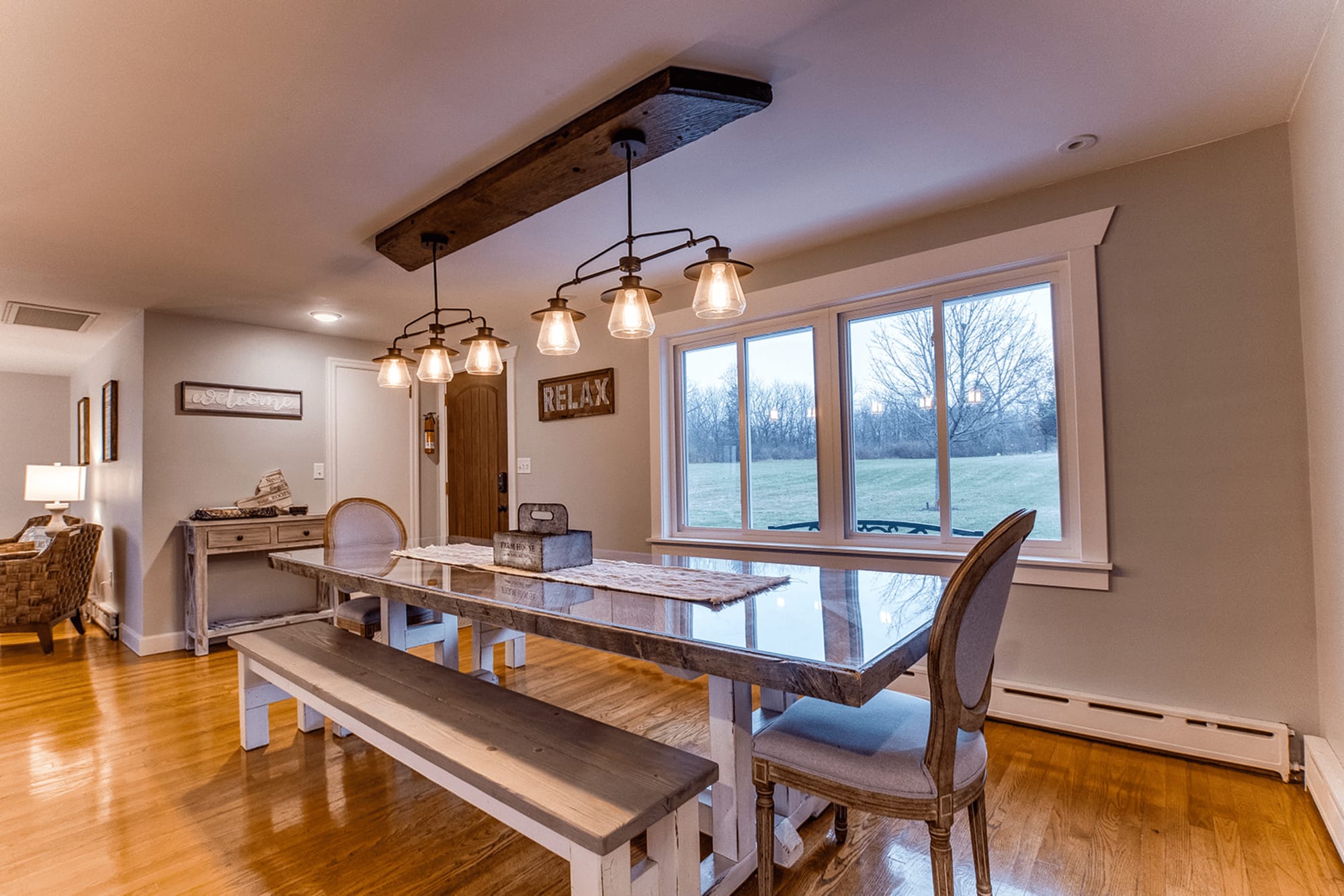 Rustic dining room with wooden furniture.