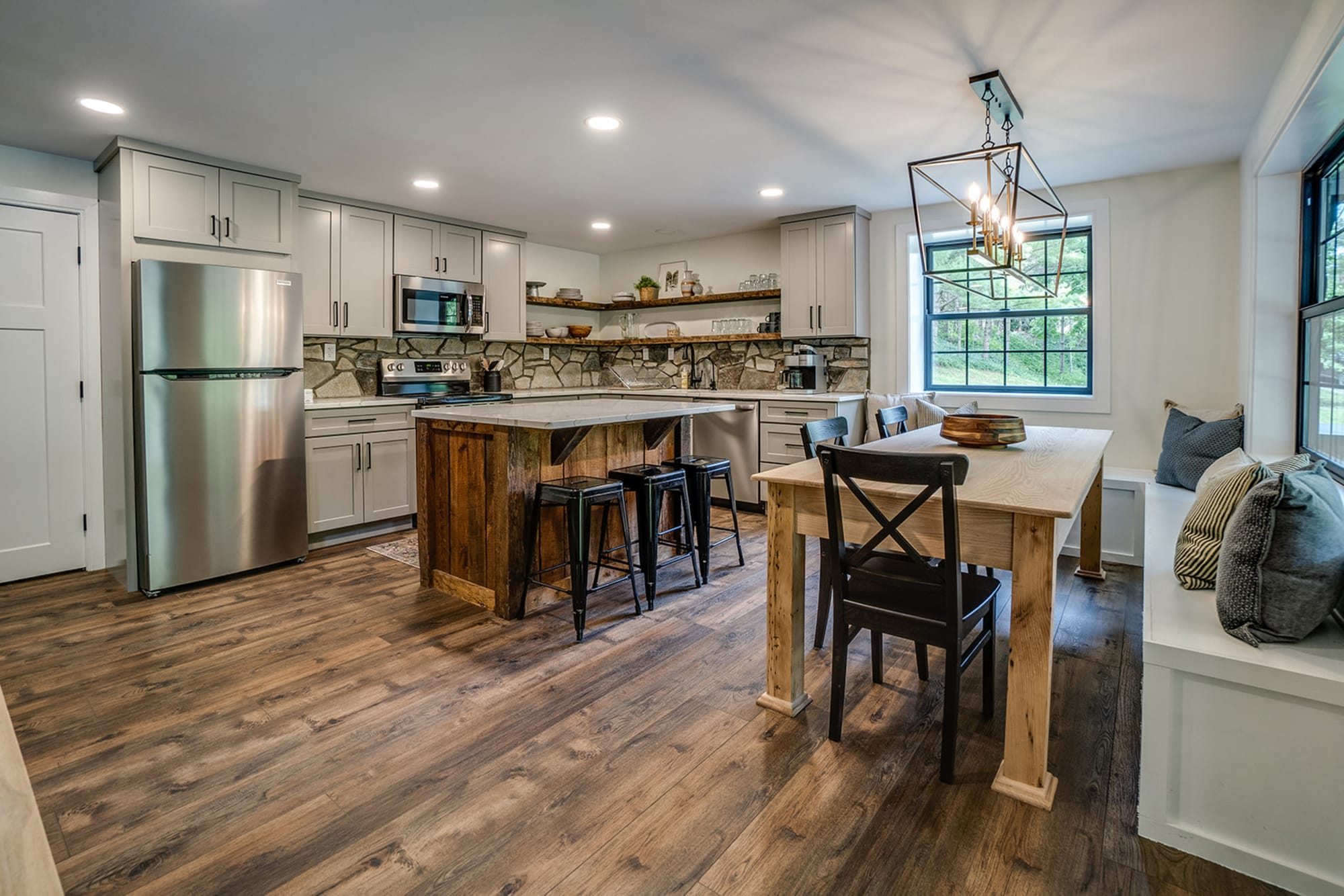 Modern kitchen with dining area.