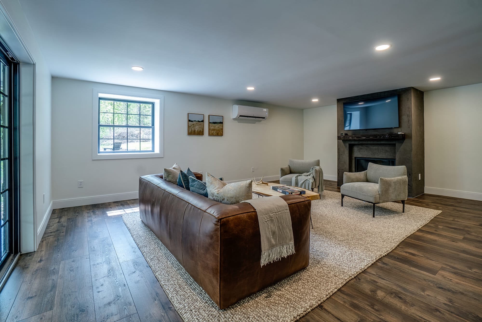 Modern living room with brown couch.