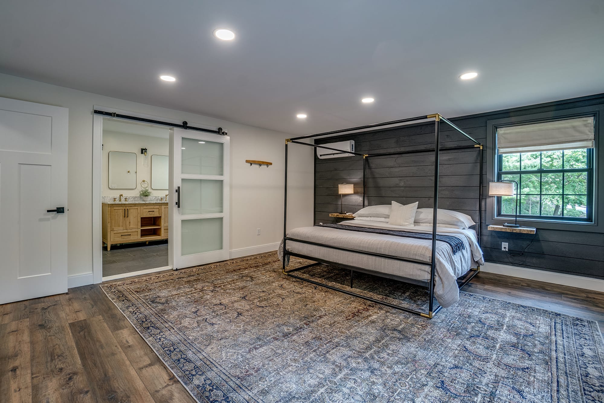 Modern bedroom with canopy bed.