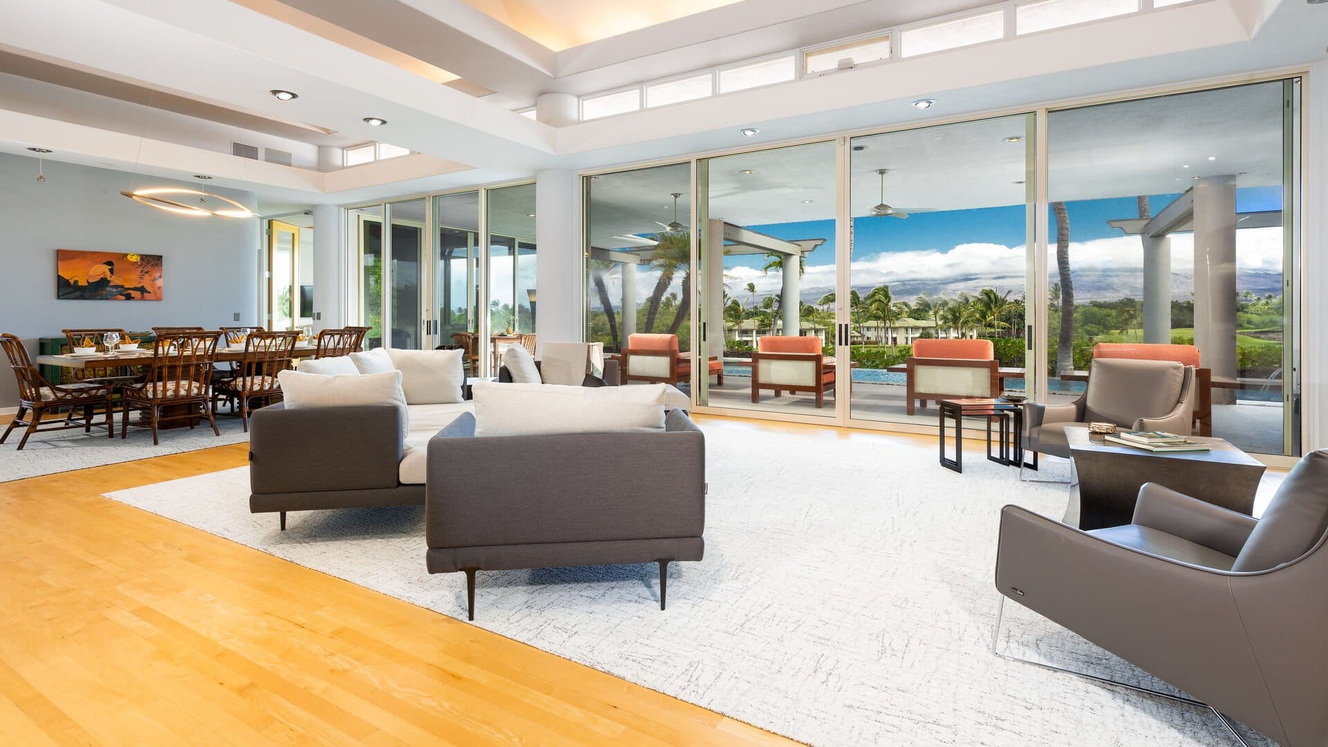 Modern living room with expansive windows.