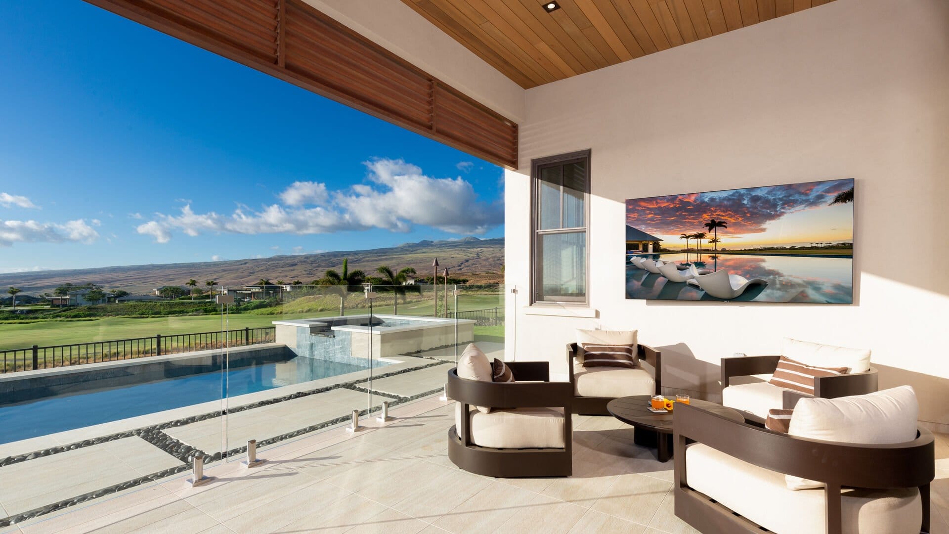 Luxurious patio with pool view.