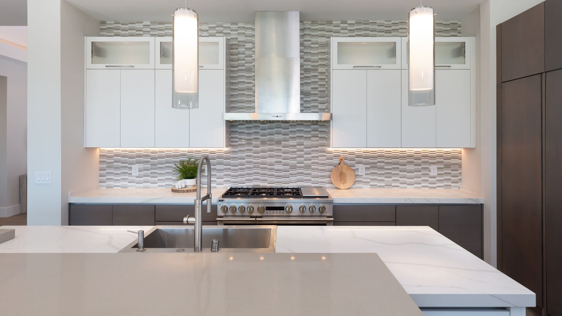 Modern kitchen with tile backsplash.