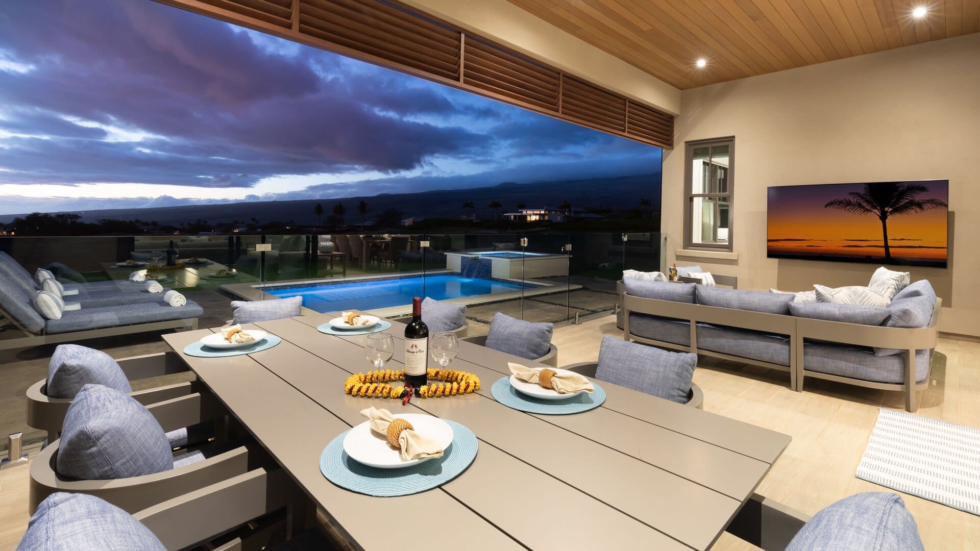 Outdoor terrace with pool view.