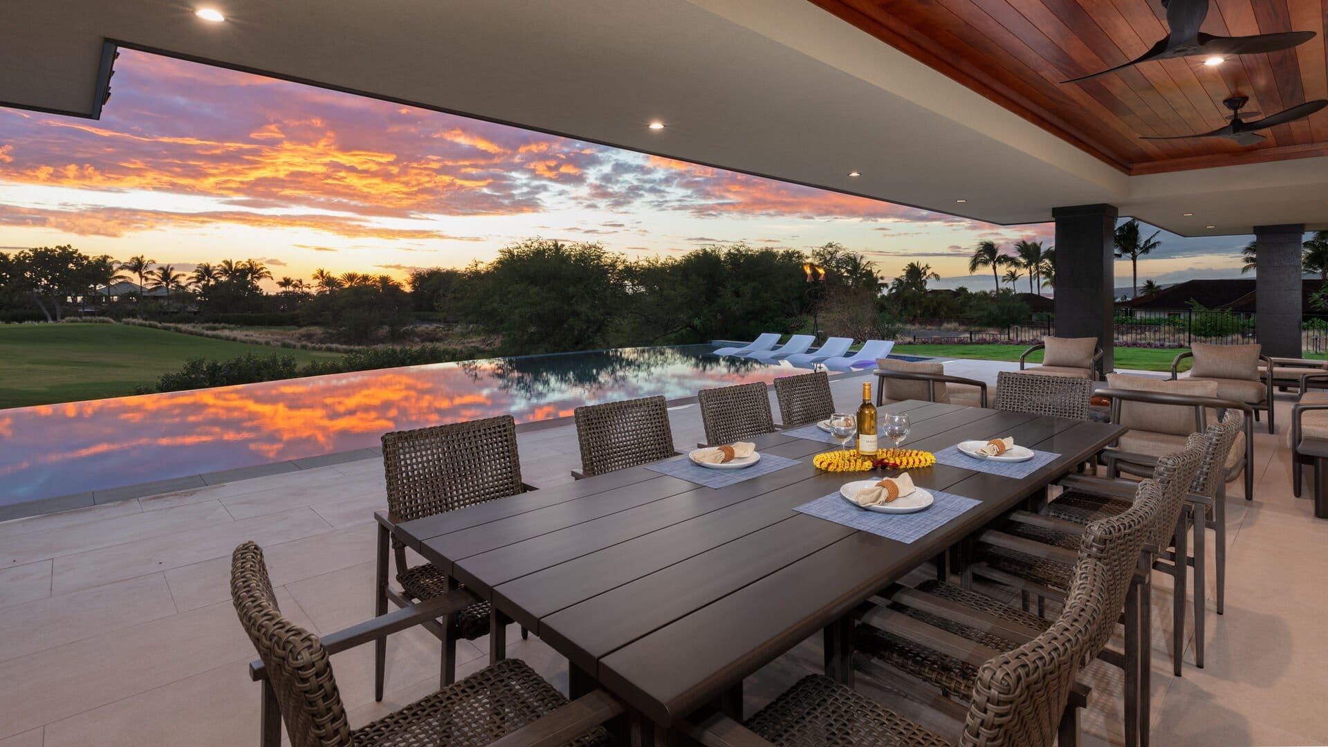 Outdoor dining area with sunset view.