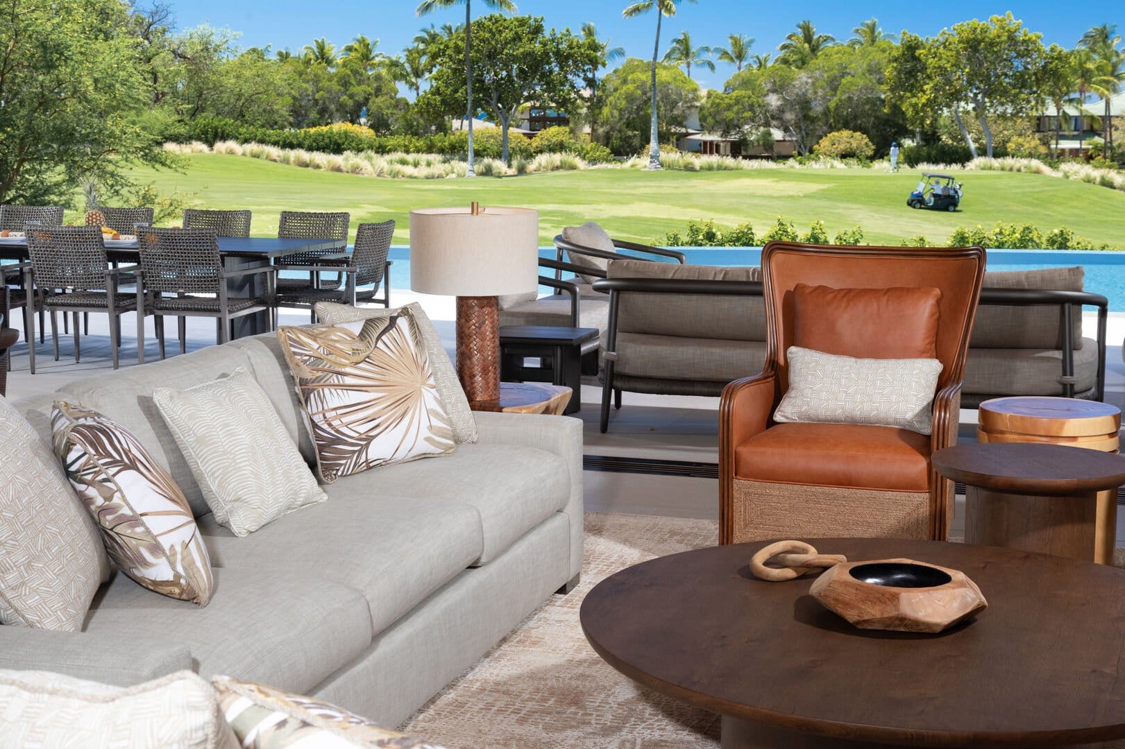 Outdoor patio with golf course view.