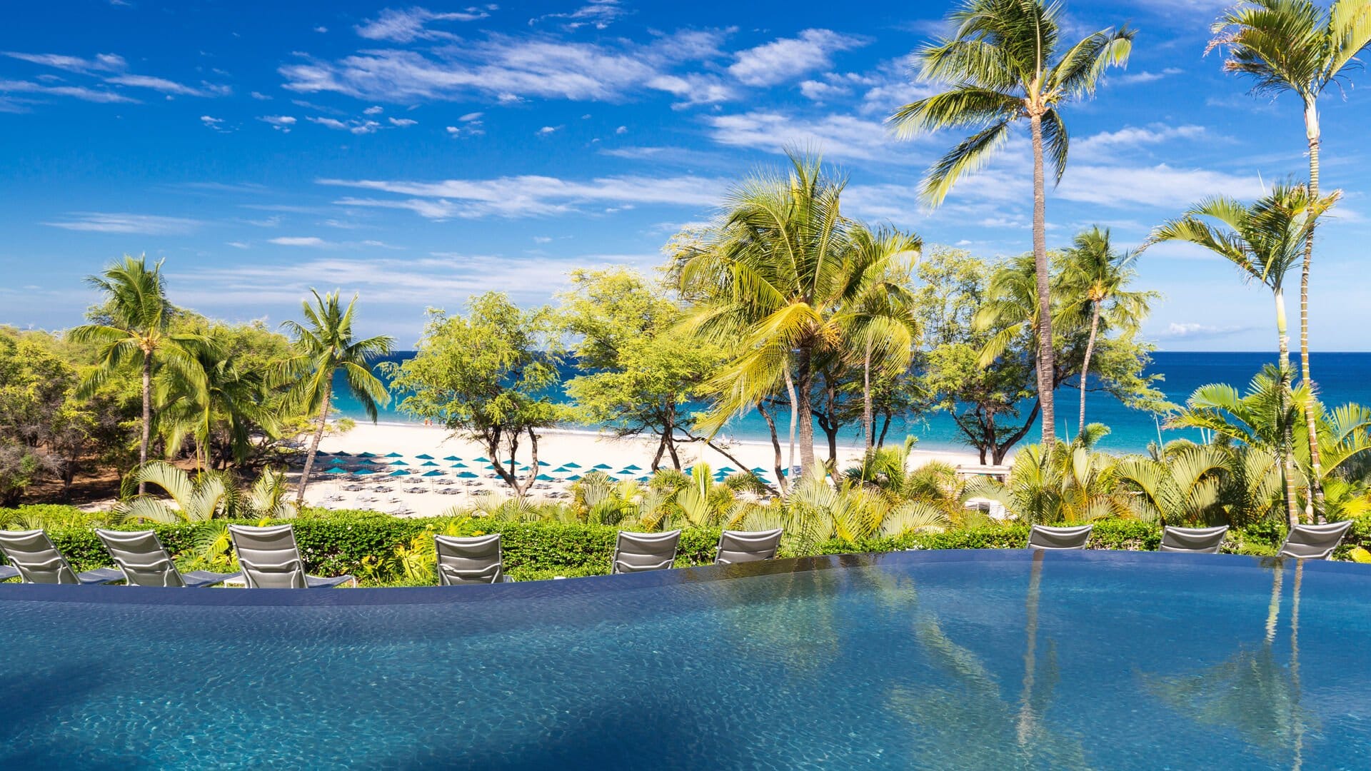 Poolside view of tropical beach.