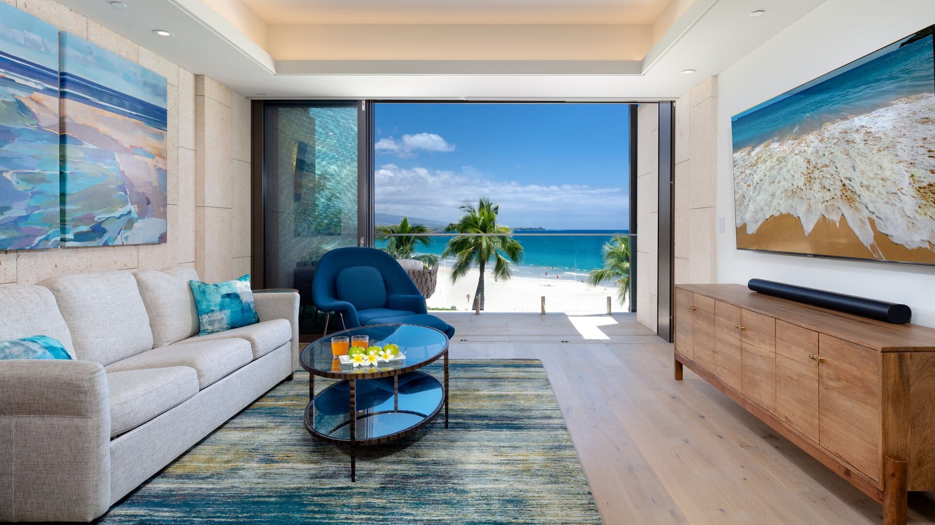 Living room overlooking tropical beach.